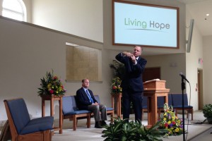 Mark Finley giving the afternoon sermon as Nathan Greene listens. 