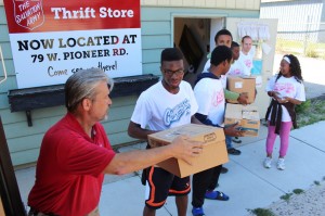 Fredericksburg pathfinders help Michael Detert, Salvation Army Thrift Store Manager move boxes during the 2014 Forever Faithful Pathfinder Camporee.