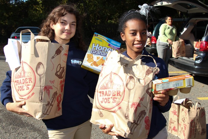 Grade 8 Students drop off bags