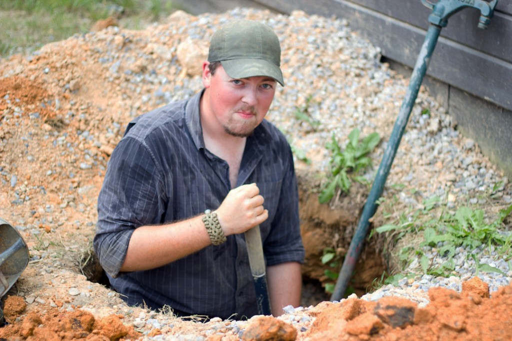 Michael Hall, wrangler, digging in and working hard. 