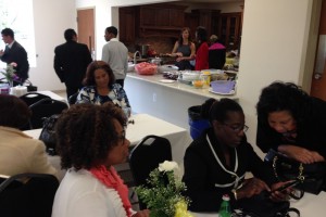 People getting ready for a light supper in the church’s community center. 