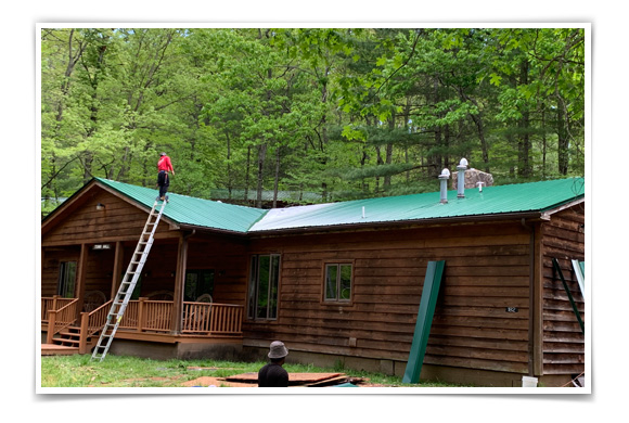 New roofs are being installed across camp.